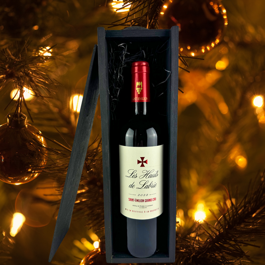 "Discover AOC Saint-Emilion Grand Cru, an elegant blend of 85% Merlot and 15% Cabernet Franc. Rich with red berries, spices, and chocolate notes, perfect for immediate enjoyment or aging."